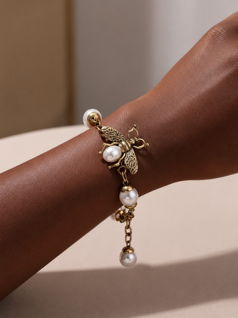 Gold Bee Charm Bracelet with White Pearls